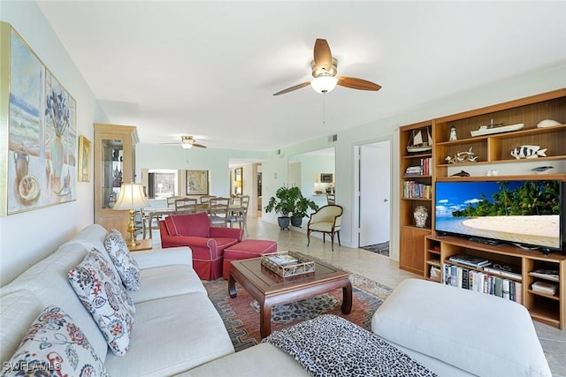 1250 Yesica Ann Cir Unit E106, Naples, FL 34110 - living room with a ceiling fan