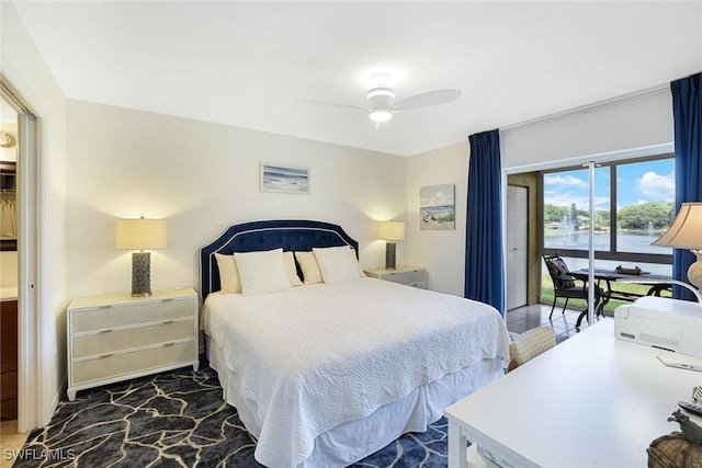 1250 Yesica Ann Cir Unit E106, Naples, FL 34110 - bedroom featuring access to exterior, ceiling fan, and a water view