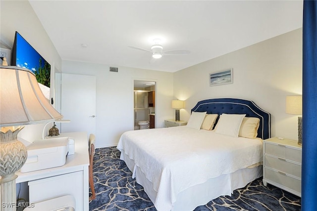 1250 Yesica Ann Cir Unit E106, Naples, FL 34110 - bedroom with ceiling fan, ensuite bath, and baseboards