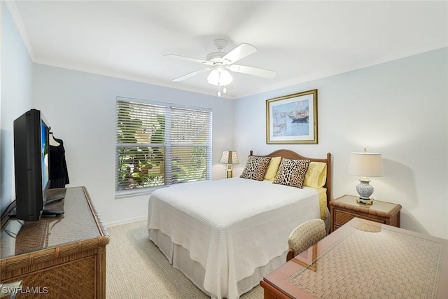 1250 Yesica Ann Cir Unit E106, Naples, FL 34110 - bedroom featuring ornamental molding, a ceiling fan, baseboards, and light colored carpet
