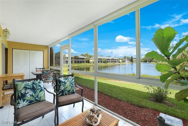 1250 Yesica Ann Cir Unit E106, Naples, FL 34110 - sunroom / solarium featuring a water view