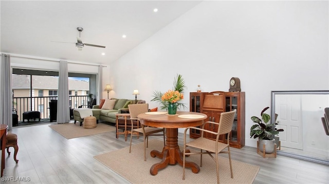 9640 Victoria Ln Unit C308, Naples, FL 34109 - dining space featuring light wood-style floors, a ceiling fan, recessed lighting, and lofted ceiling