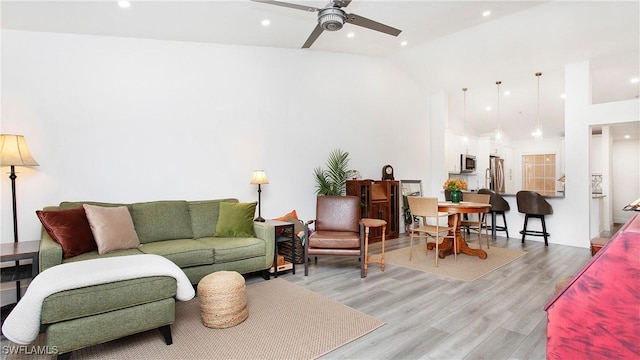 9640 Victoria Ln Unit C308, Naples, FL 34109 - living room with ceiling fan, light wood-style flooring, recessed lighting, and high vaulted ceiling