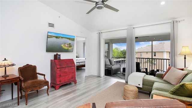 9640 Victoria Ln Unit C308, Naples, FL 34109 - living room featuring ceiling fan, light wood-style flooring, and high vaulted ceiling
