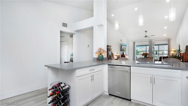 9640 Victoria Ln Unit C308, Naples, FL 34109 - kitchen featuring stainless steel dishwasher, a ceiling fan, light wood finished floors, white cabinetry, and recessed lighting