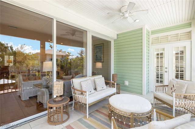 11533 Andy Rosse Ln, Captiva, FL 33924 - wooden terrace with ceiling fan, an outdoor hangout area, and french doors