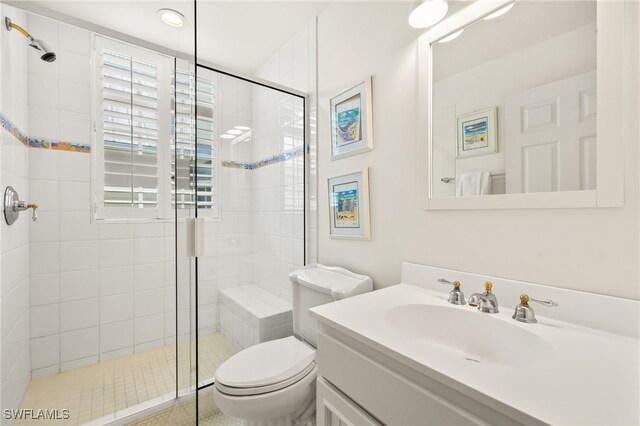 11533 Andy Rosse Ln, Captiva, FL 33924 - full bath with a stall shower, vanity, and toilet