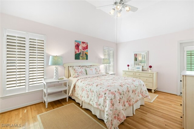 11533 Andy Rosse Ln, Captiva, FL 33924 - bedroom with light wood-style floors, baseboards, and ceiling fan