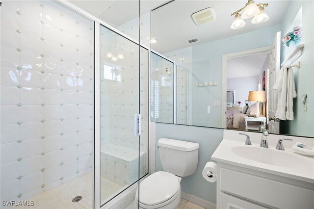 11533 Andy Rosse Ln, Captiva, FL 33924 - ensuite bathroom with vanity, a stall shower, and toilet