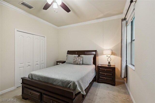 10996 Cherry Laurel Dr, Fort Myers, FL 33912 - carpeted bedroom featuring ornamental molding, a closet, baseboards, and a ceiling fan