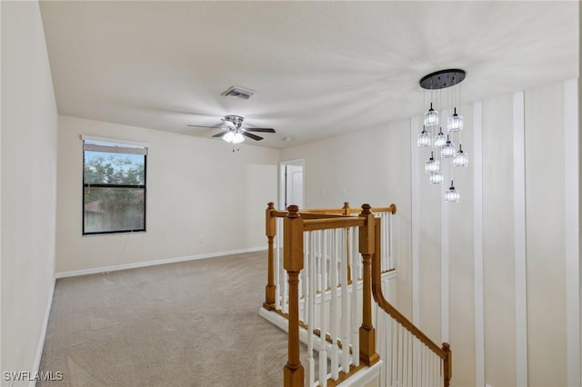 10996 Cherry Laurel Dr, Fort Myers, FL 33912 - hall featuring an upstairs landing, carpet flooring, and baseboards