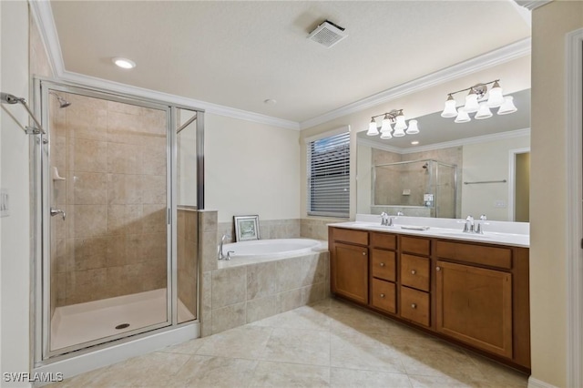 10996 Cherry Laurel Dr, Fort Myers, FL 33912 - bathroom featuring a bath, a shower stall, double vanity, tile patterned flooring, and crown molding