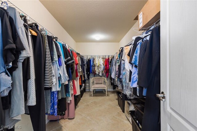 10996 Cherry Laurel Dr, Fort Myers, FL 33912 - spacious closet with light tile patterned floors