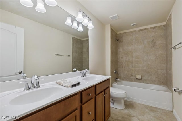 10996 Cherry Laurel Dr, Fort Myers, FL 33912 - bathroom featuring double vanity, toilet, tile patterned floors, and shower / bathtub combination