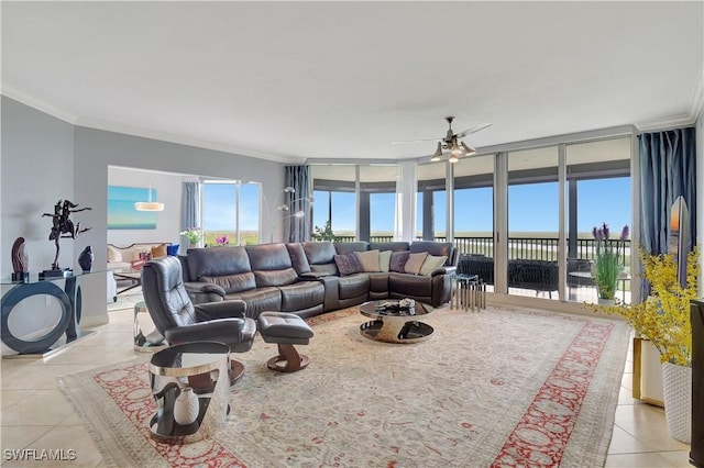 1050 Borghese Ln Unit 801, Naples, FL 34114 - living area featuring light tile patterned floors, ornamental molding, and a ceiling fan