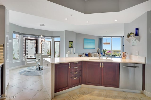 1050 Borghese Ln Unit 801, Naples, FL 34114 - kitchen featuring dishwasher, a sink, light countertops, light tile patterned floors, and recessed lighting