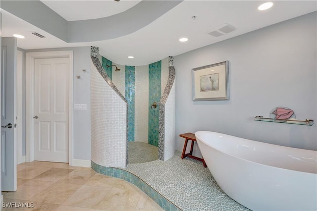 1050 Borghese Ln Unit 801, Naples, FL 34114 - full bath featuring tiled shower, a freestanding tub, and recessed lighting