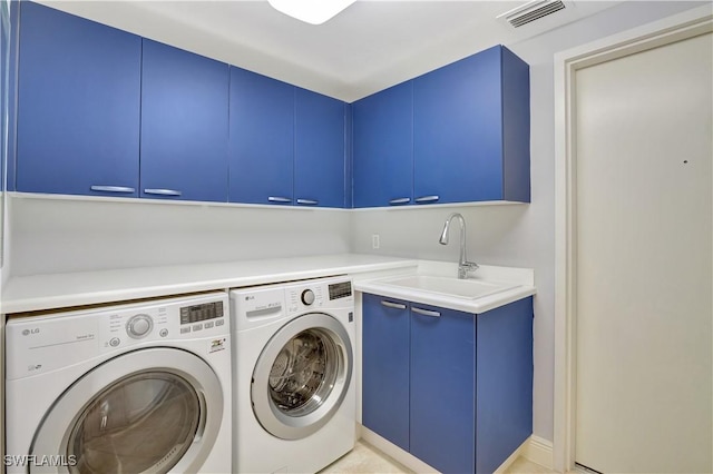 1050 Borghese Ln Unit 801, Naples, FL 34114 - washroom with cabinet space and washer and clothes dryer