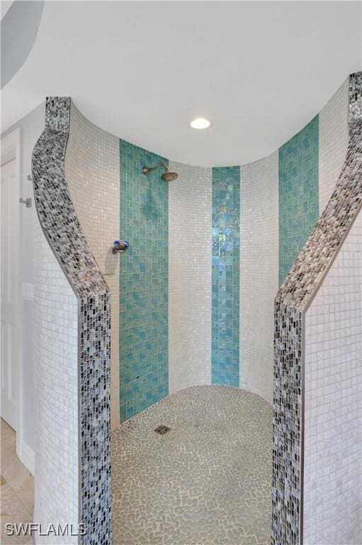 1050 Borghese Ln Unit 801, Naples, FL 34114 - full bathroom with a tile shower, tile walls, and recessed lighting
