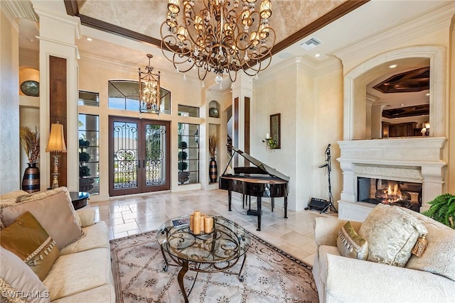 1547 Caxambas Ct, Marco Island, FL 34145 - living room featuring a chandelier, ornate columns, ornamental molding, a towering ceiling, and recessed lighting