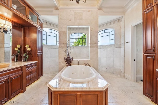 1547 Caxambas Ct, Marco Island, FL 34145 - bathroom featuring healthy amount of natural light, ornamental molding, a tub with jets, vanity, and tile walls