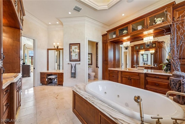1547 Caxambas Ct, Marco Island, FL 34145 - full bath with vanity, crown molding, toilet, a whirlpool tub, and recessed lighting