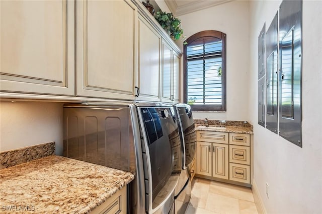 1547 Caxambas Ct, Marco Island, FL 34145 - washroom with separate washer and dryer, cabinet space, ornamental molding, and arched walkways