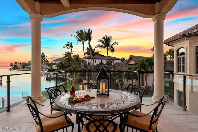 1547 Caxambas Ct, Marco Island, FL 34145 - balcony featuring a water view and outdoor dining area
