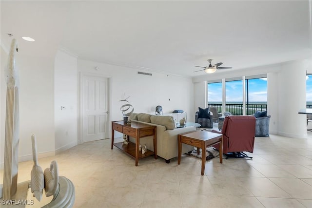 1060 Borghese Ln Unit 1005, Naples, FL 34114 - living area featuring a ceiling fan