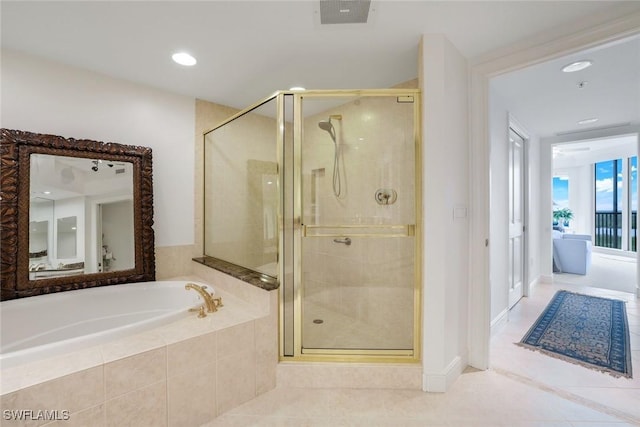 1060 Borghese Ln Unit 1005, Naples, FL 34114 - full bathroom with tiled tub, tile patterned floors, a shower stall, and recessed lighting