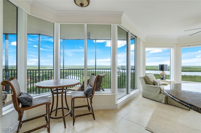 1060 Borghese Ln Unit 1005, Naples, FL 34114 - sunroom / solarium with a water view, tile patterned floors, and ornamental molding