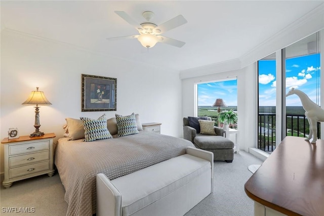 1060 Borghese Ln Unit 1005, Naples, FL 34114 - carpeted bedroom featuring access to exterior, ornamental molding, and a ceiling fan