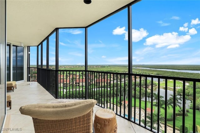 1060 Borghese Ln Unit 1005, Naples, FL 34114 - balcony with a water view