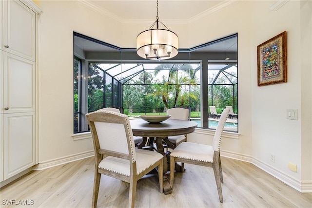 20081 Chapel Trce, Estero, FL 33928 - dining space with a sunroom, light wood-type flooring, ornamental molding, and a chandelier