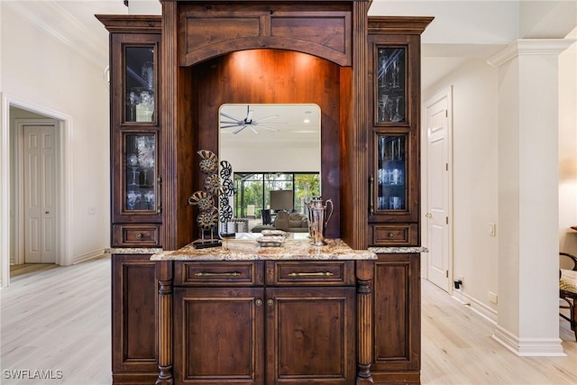 20081 Chapel Trce, Estero, FL 33928 - bar with light wood finished floors and a ceiling fan