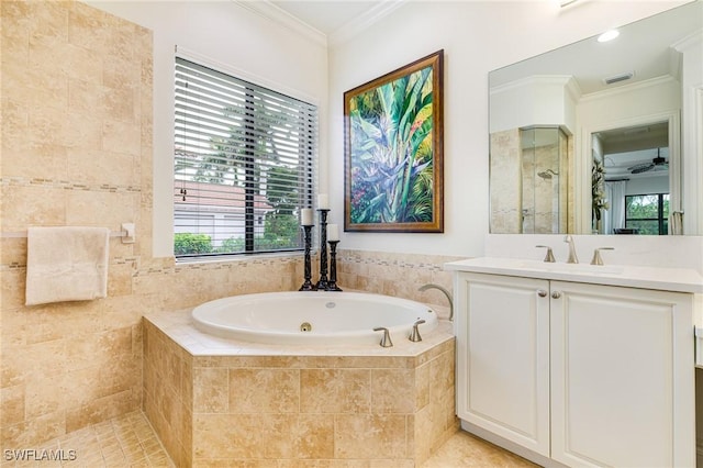 20081 Chapel Trce, Estero, FL 33928 - bathroom with ornamental molding, a whirlpool tub, vanity, a tile shower, and tile patterned floors