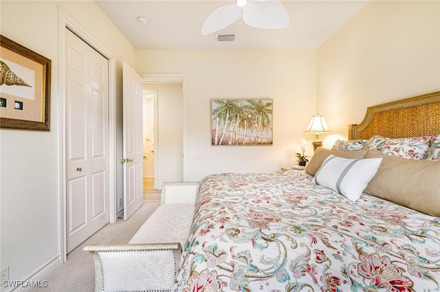 20081 Chapel Trce, Estero, FL 33928 - bedroom with light colored carpet, a ceiling fan, and a closet
