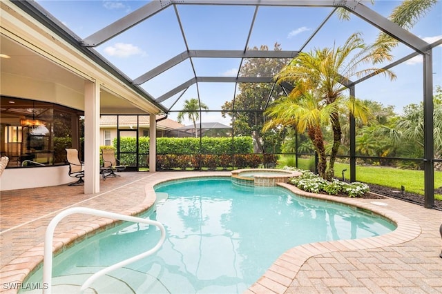 20081 Chapel Trce, Estero, FL 33928 - view of pool featuring a patio, a lanai, and a pool with connected hot tub