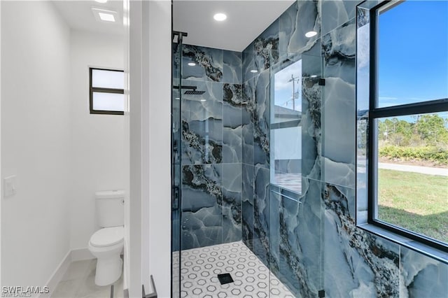 1059 Brenton Ave, Lehigh Acres, FL 33974 - bathroom with healthy amount of natural light, a marble finish shower, toilet, baseboards, and recessed lighting