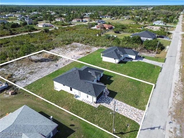 1059 Brenton Ave, Lehigh Acres, FL 33974 - aerial perspective of suburban area featuring property boundaries highlighted