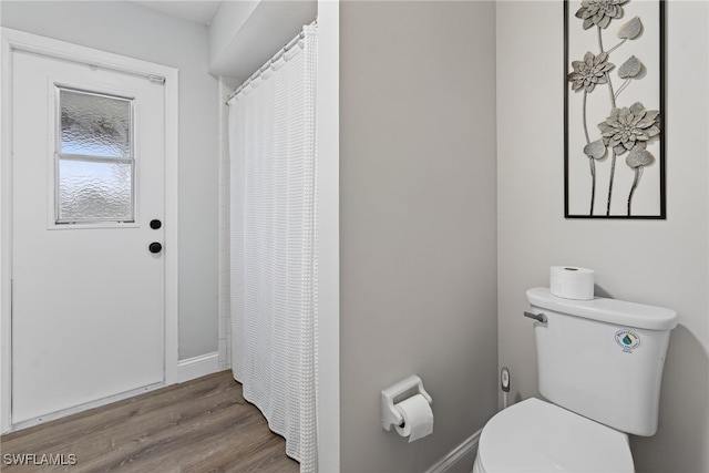 24769 Paradise Rd, Bonita Springs, FL 34135 - bathroom featuring wood finished floors and a shower with curtain