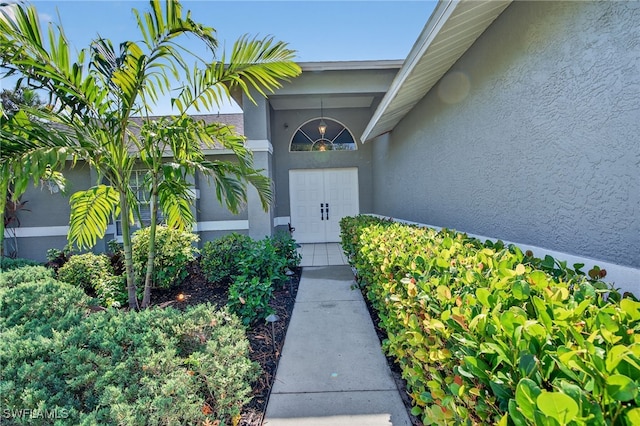 24769 Paradise Rd, Bonita Springs, FL 34135 - entrance to property with stucco siding