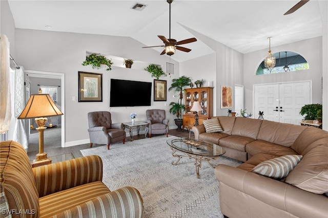 24769 Paradise Rd, Bonita Springs, FL 34135 - living area featuring a ceiling fan, wood finished floors, and high vaulted ceiling