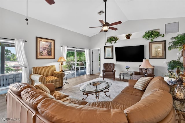 24769 Paradise Rd, Bonita Springs, FL 34135 - living area with ceiling fan, lofted ceiling, and wood finished floors