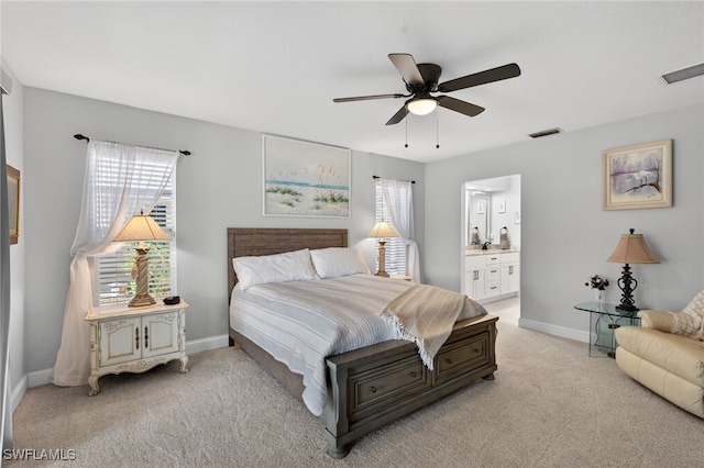 24769 Paradise Rd, Bonita Springs, FL 34135 - bedroom featuring light carpet, connected bathroom, and ceiling fan