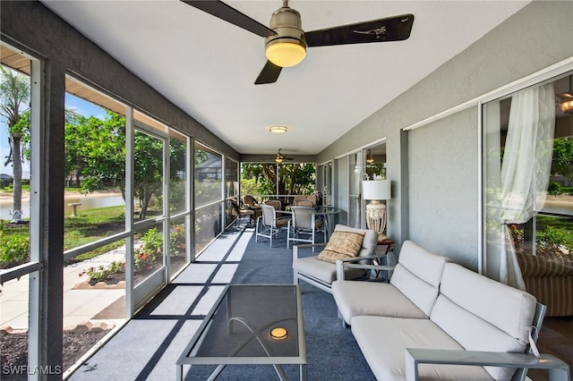 24769 Paradise Rd, Bonita Springs, FL 34135 - sunroom featuring ceiling fan, outdoor lounge area, a water view, and outdoor dining area