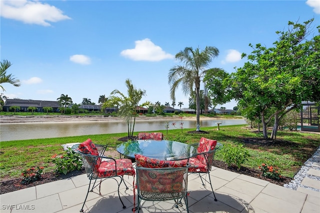 24769 Paradise Rd, Bonita Springs, FL 34135 - view of patio / terrace featuring a water view and outdoor dining area