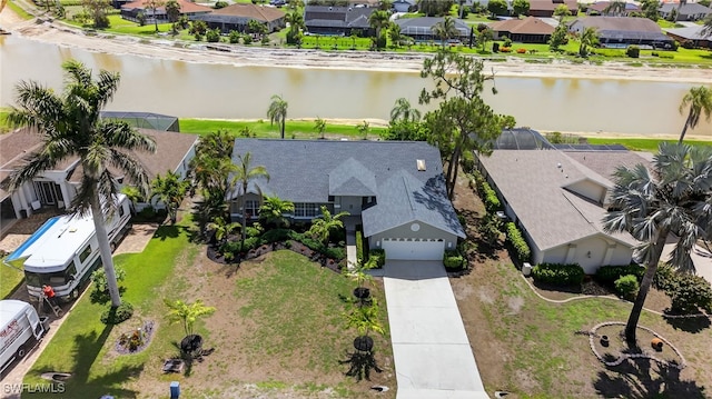 24769 Paradise Rd, Bonita Springs, FL 34135 - aerial perspective of suburban area with a nearby body of water