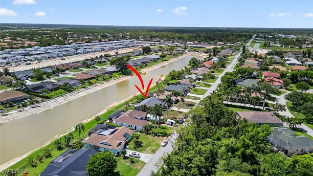 24769 Paradise Rd, Bonita Springs, FL 34135 - aerial overview of property's location featuring nearby suburban area and a large body of water