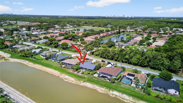 24769 Paradise Rd, Bonita Springs, FL 34135 - aerial perspective of suburban area featuring a nearby body of water